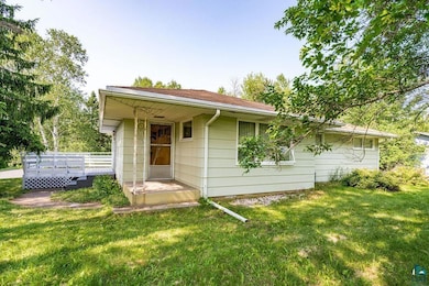 View of front of house featuring a front lawn