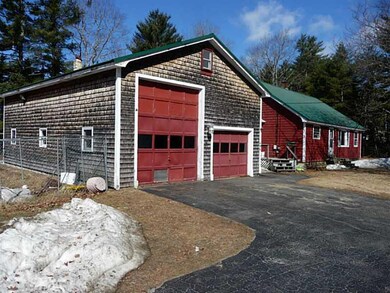 Exterior Front. Massive Garage.....