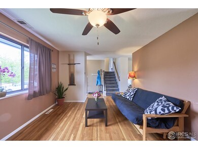 Living room w/stairs up to 3 BR/1BA