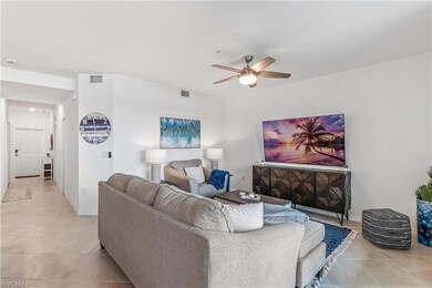Tiled living room with ceiling fan