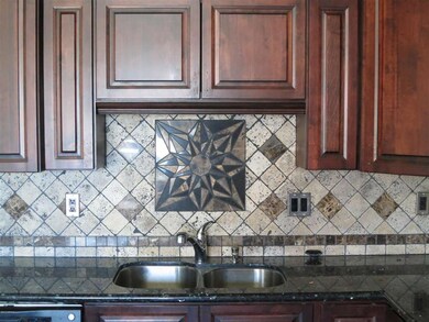 Tile Backsplash and Premium Cabinets