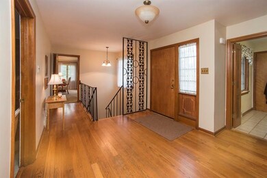 Foyer at front entrance showing beautiful wood flo