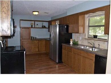Kitchen view, pantry and plenty of storage.