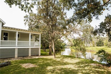 Side view, porch, and bayou