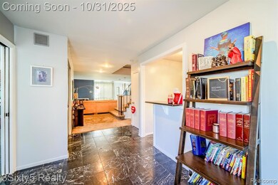 Corridor with baseboards and dark marble finish flooring