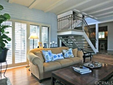 Living room opens to a private side patio 