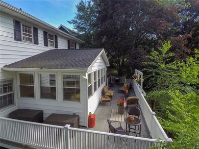 Large back porch perfect for dining, grilling, and