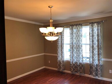 View in Dining Room w Crown Moulding