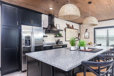 Interior of similar cabin in community. Interior finishes and furnishings will vary from cabin to cabin.
