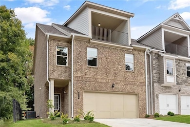 Multi unit property with brick siding, a garage, c