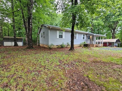View of front of house featuring crawl space, a po