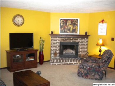 Large Family Room with Brick Surround Fireplace