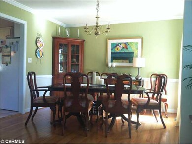 Dining Room - Hardwood floors, crown molding chair