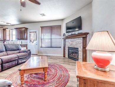 Living room with light wood-type flooring, ceiling