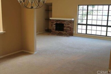 Family room with brick fireplace and huge window o