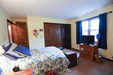 Another view of the nice size bedroom with big window for lots of natural light flowing through.