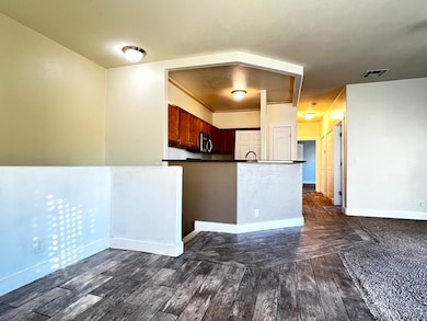 View from the dining room. 1/2 wall is primed just not finished with paint.