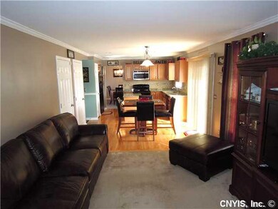 Kitchen. Crown Molding throughout the first floor.