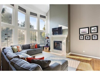 Soaring ceilings highlight full-view windows