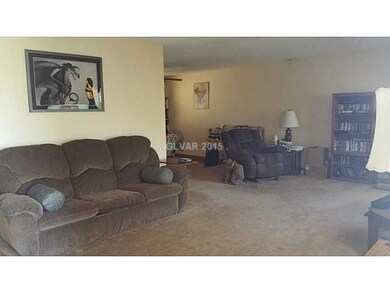 Living Room. Dining area in background.