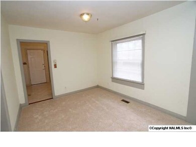 Dining area opens to the large living room