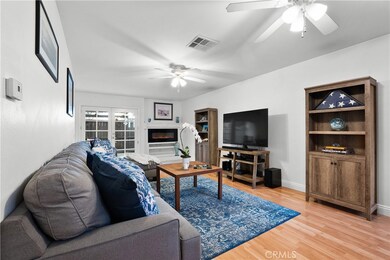 Living Room view including electric fireplace