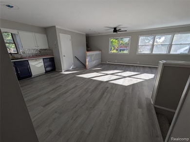 Plenty of room for dining table / second (back stairs) set of stairs to lower level off kitchen