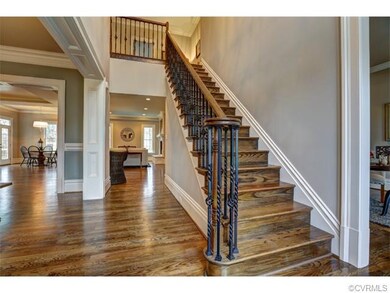 A fabulous open floor plan, gorgeous custom moldin