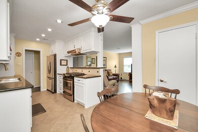 The beautiful kitchen features lovely recessed lig