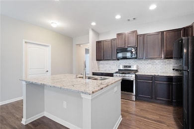 Spacious kitchen with elegant cabinetry and tastef
