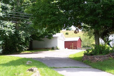 View of Garage and Barn