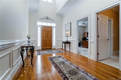 Gorgeous entry showing bedroom 2 and full bath acc