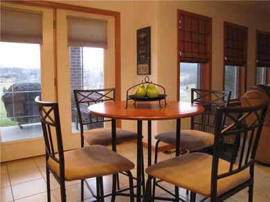 Kitchen. The breakfast room area. Double doors to 