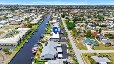 Aerial view with a residential view and a water vi