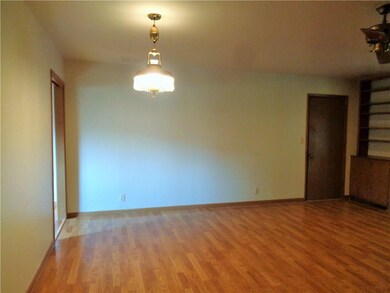 Dining room area. Door on right leads to garage.