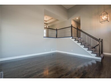 HARDWOOD FLOOR IN LIVING ROOM IS AN UPGRADE.  BUYE