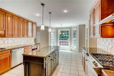 Imagine preparing meals in this gourmet kitchen adorned with beautiful granite countertops.  The bay window in the breakfast area allows abundant natural lighting to enter this space.