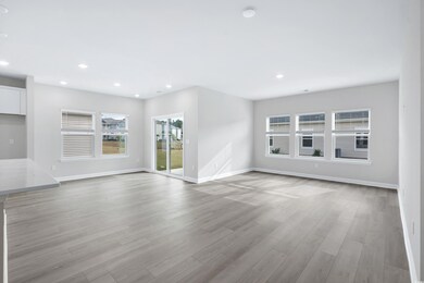 Unfurnished living room with light wood-type floor