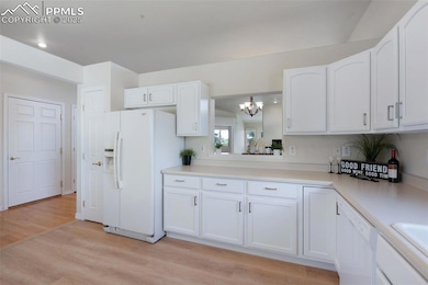 Clean crisp white cabinet and counters