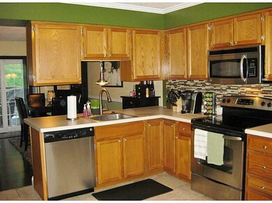 Kitchen. Large kitchen opens to dining room and is