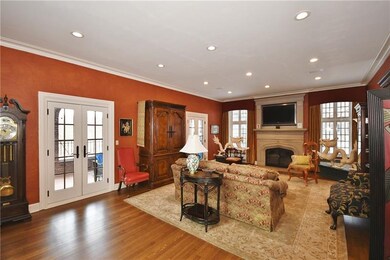 Gorgeous living room boasts new French doors leadi