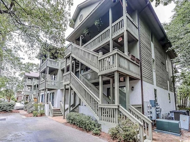 View of side of home with stucco siding