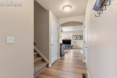 Corridor with a textured ceiling and low maintenan