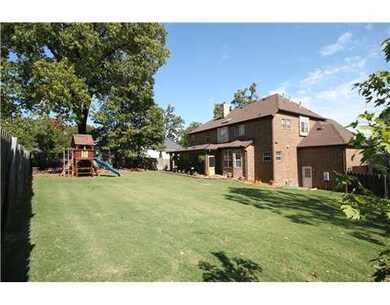 Exterior Back. LG FENCED IN BACKYARD