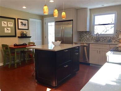Spacious kitchen leads out to new deck!