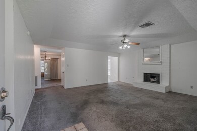 Living Room with Wood-Burning Fireplace