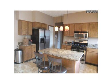 The kitchen surrounds you with oak cabinets and a 