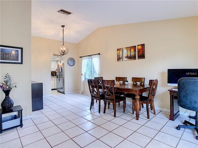 Looking from the foyer to the formal living and di