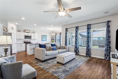 Living room to kitchen is open and easy for entert