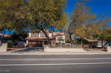Mediterranean / spanish house featuring concrete driveway, a tile roof, a garage, and stucco siding